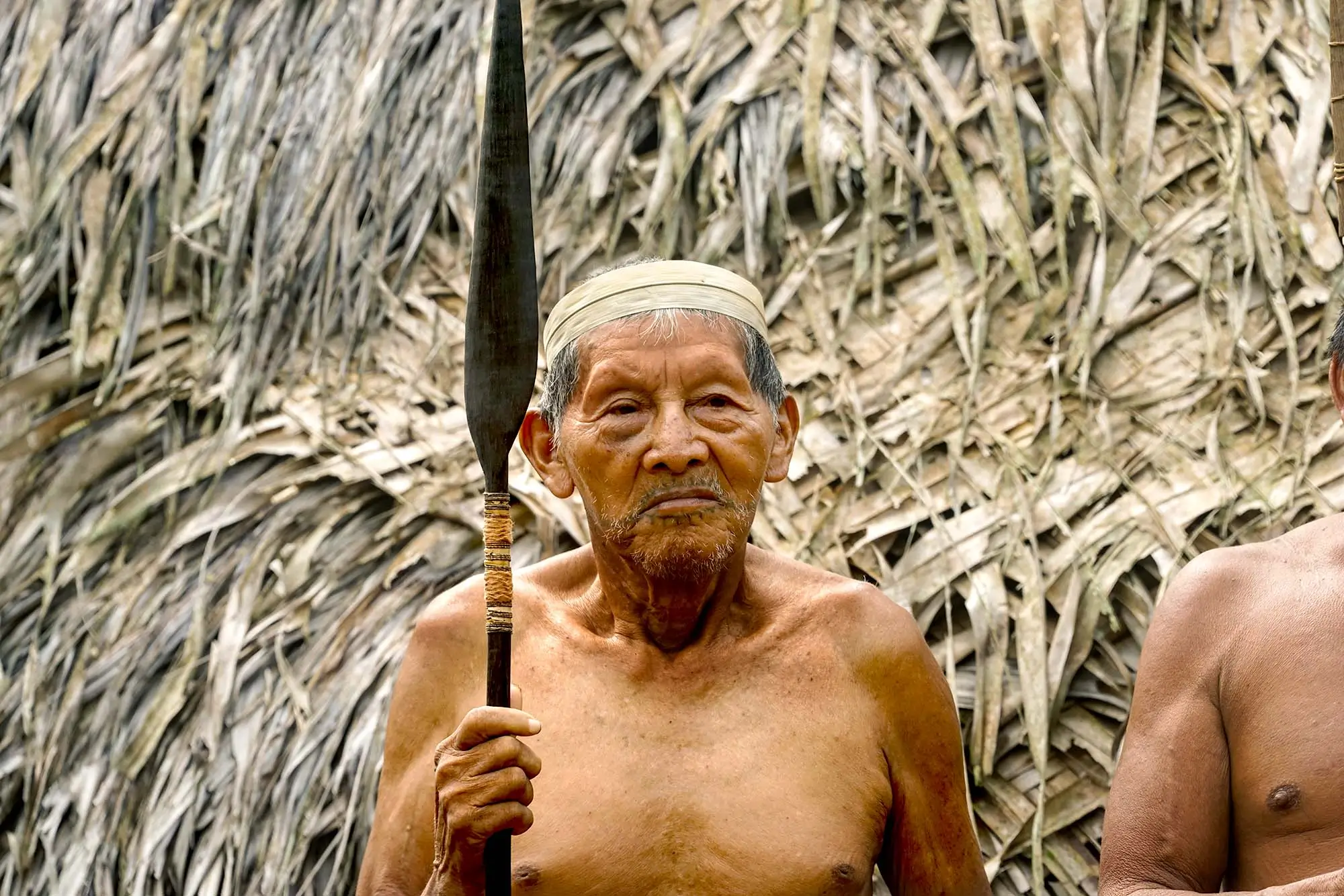 Matsés Elder with Traditional Hunting Spear at Communal Longhouse (Maloca)