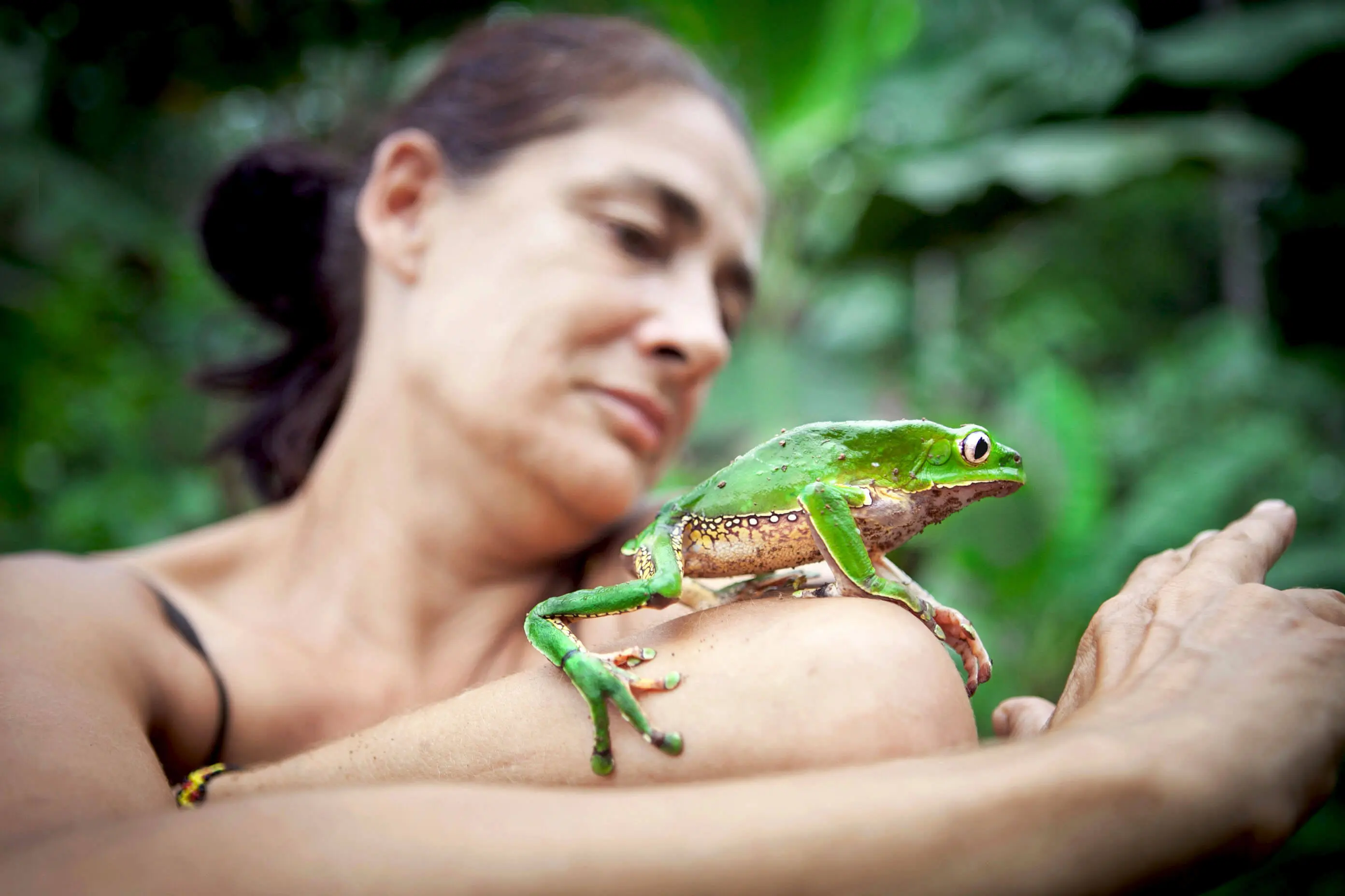 Woman with a giant monkey frog